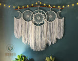 White Dreamcatcher Set Hanging Above the Bed SD01